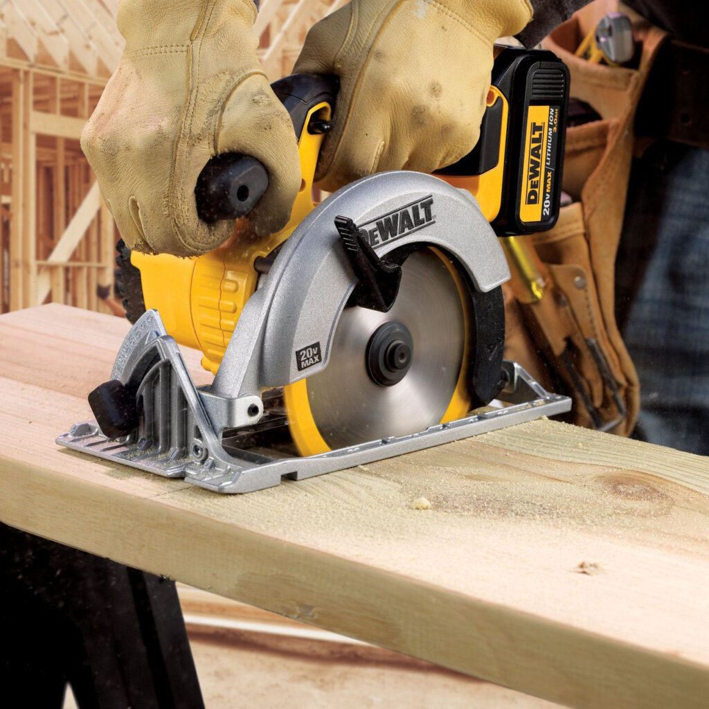 A carpenter using a DeWALT circular saw to cut timber